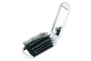 Foldable travel hairbrush "Elvis" with mirror