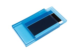 Business card holder "Invite" with a sliding lid, clip mechanism and a frosted bottom